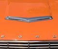 Homestead, Pennsylvania, USA July 21, 2021 An orange hood of a vintage Ford automobile with a metal hood scoop Royalty Free Stock Photo