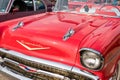 Homestead, Pennsylvania, USA July 21, 2021 Two silver hood ornaments on a vintage red Chevrolet convertible Royalty Free Stock Photo