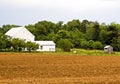 Homestead with Plowed Field Royalty Free Stock Photo