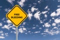 free bleeding traffic sign on blue sky Royalty Free Stock Photo
