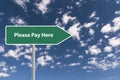 please pay here traffic sign on blue sky Royalty Free Stock Photo