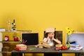 Homework and study time concept. Girl at desk with books Royalty Free Stock Photo