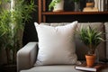 Homey comfort White square pillow mockup on a cozy grey armchair