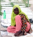 Homless indian muslim women begging in the street