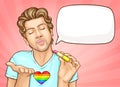 Homosexual man sending air kiss with closed eyes. Royalty Free Stock Photo