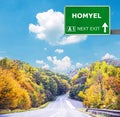 HOMYEL road sign against clear blue sky Royalty Free Stock Photo