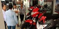 Honda bike presenting by sales team to the customer