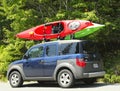 Honda Element minivan loaded with kayaks