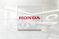 Honda logo on glossy wall texture