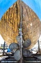Rusty propeller and hull of ship in the slipway