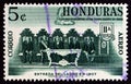 HONDURAS - CIRCA 1961: A stamp printed in Honduras shows Arbitration commission delivering its award, circa 1961.