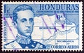 HONDURAS - CIRCA 1961: A stamp printed in Honduras shows Alfonso XIII king of Spain and map, circa 1961. Royalty Free Stock Photo