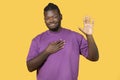 Honest Black Man Doing Oath Gesture Posing Over Yellow Background Royalty Free Stock Photo