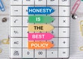 Honesty Is The Best Policy Message. a note on colored stickers on a white calculator Royalty Free Stock Photo