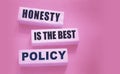 Honesty is the best policy Words Written In Wooden blocks. Trustworthy, truth, beliefs and agreement business concept Royalty Free Stock Photo