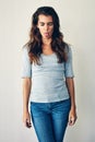 Honesty is my best policy. Studio shot of an attractive young woman posing against a grey background.