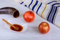 Honey, apple and pomegranate for traditional holiday symbols rosh hashanah jewesh holiday on wooden background.