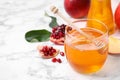 Honey, apples and pomegranate on white table. Rosh Hashanah holiday Royalty Free Stock Photo