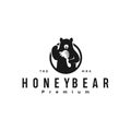 Honey bear with bee hive logo vector design illustration with a drop of honey icon mascot silhouette . retro vintage symbol emblem Royalty Free Stock Photo