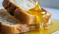 honey being poured onto slices of bread with honey dripping over them Royalty Free Stock Photo