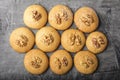 Honey biscuits with a kernel of walnut. Dark background