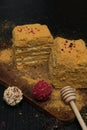 Sweet homemade honey cake on a black wooden table Royalty Free Stock Photo