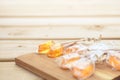 Honey caramel candy lollipop on wooden background