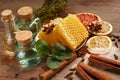 Honey, cinnamon and dried fruits on a wooden table. Healthy eating Royalty Free Stock Photo