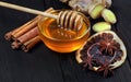 Honey, cinnamon, ginger and anise on a wooden table. Royalty Free Stock Photo