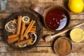 Honey and cinnamon on a wooden table Royalty Free Stock Photo