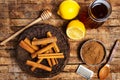 Honey and cinnamon on a wooden table Royalty Free Stock Photo