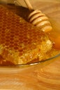 Honey comb and Drizzler Royalty Free Stock Photo