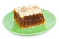 Honey comb on a plate Royalty Free Stock Photo