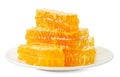 Honey comb on a plate on a white background. Isolated Royalty Free Stock Photo