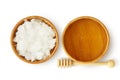 Honey and cononut oil in wooden bowl on white background - Homemade beauty mask ingredients