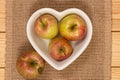 Honey Crisp Apples in a Heart Shaped Bowl Royalty Free Stock Photo