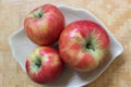 Honey crisp apples on a wooden table Royalty Free Stock Photo