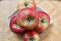 Honey crisp apples on a wooden table Royalty Free Stock Photo