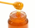 Honey dripper and Honey jar isolated Royalty Free Stock Photo