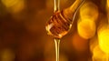 Honey dripping. Close up, honey dipping from the wooden honey spoon. Royalty Free Stock Photo