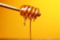 Honey elegance golden drops fall from a spoon, yellow backdrop