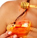 Honey facial mask with fresh fruits and honeycombs for hair .