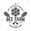 Honey farm badge. Vector. Concept for shirt, print, stamp or tee. Vintage typography design with honeycomb piece and