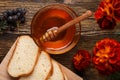 Honey in a glass bowl with slices of white bread Royalty Free Stock Photo