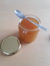 honey, glass of honey with a spoon Royalty Free Stock Photo