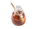 Honey in glass jar with wood dipper isolated on whit ebackground Royalty Free Stock Photo