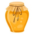 Honey. Glass pot full of honey and a honey ladle.