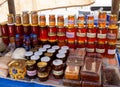 Honey ib glass jar on the market. Selling natural organic bee honey on Turkish bazaar.