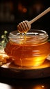 Honey jar, companioned by wooden dipper a pairing for indulgence in sweetness