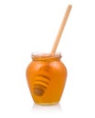 Honey jar with drizzler Royalty Free Stock Photo